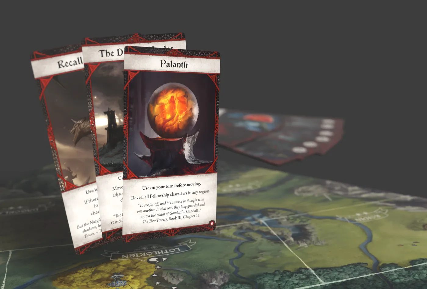 Trois cartes spéciales du camp de Sauron, dont le Palantír, au-dessus du plateau