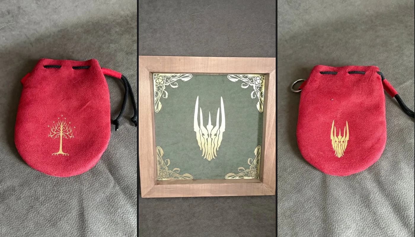 Pochons à dés à l'Arbre du Gondor et au casque de Sauron, et piste à dés en bois avec Sauron